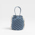 Blue drawstring bag with white patterns on a light gray background