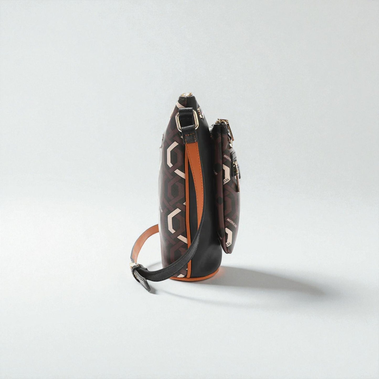 Small handbag with geometric pattern on a light gray background