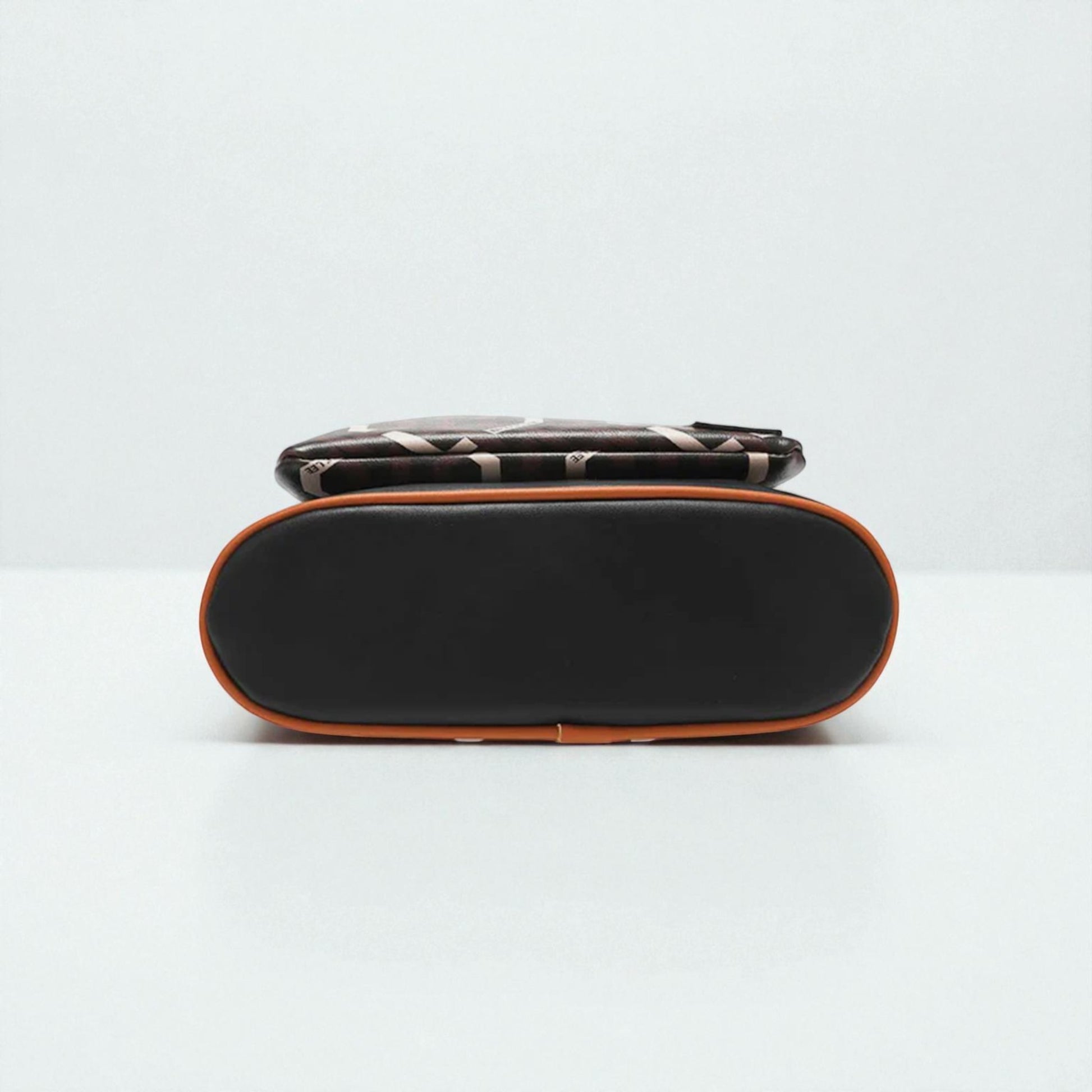 Black and brown rectangular pouch on a white background