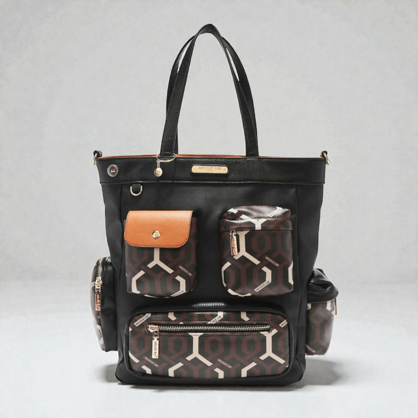 Black backpack with patterned pockets on a gray background