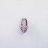 Pink leather keychain with gold accents on a light gray background