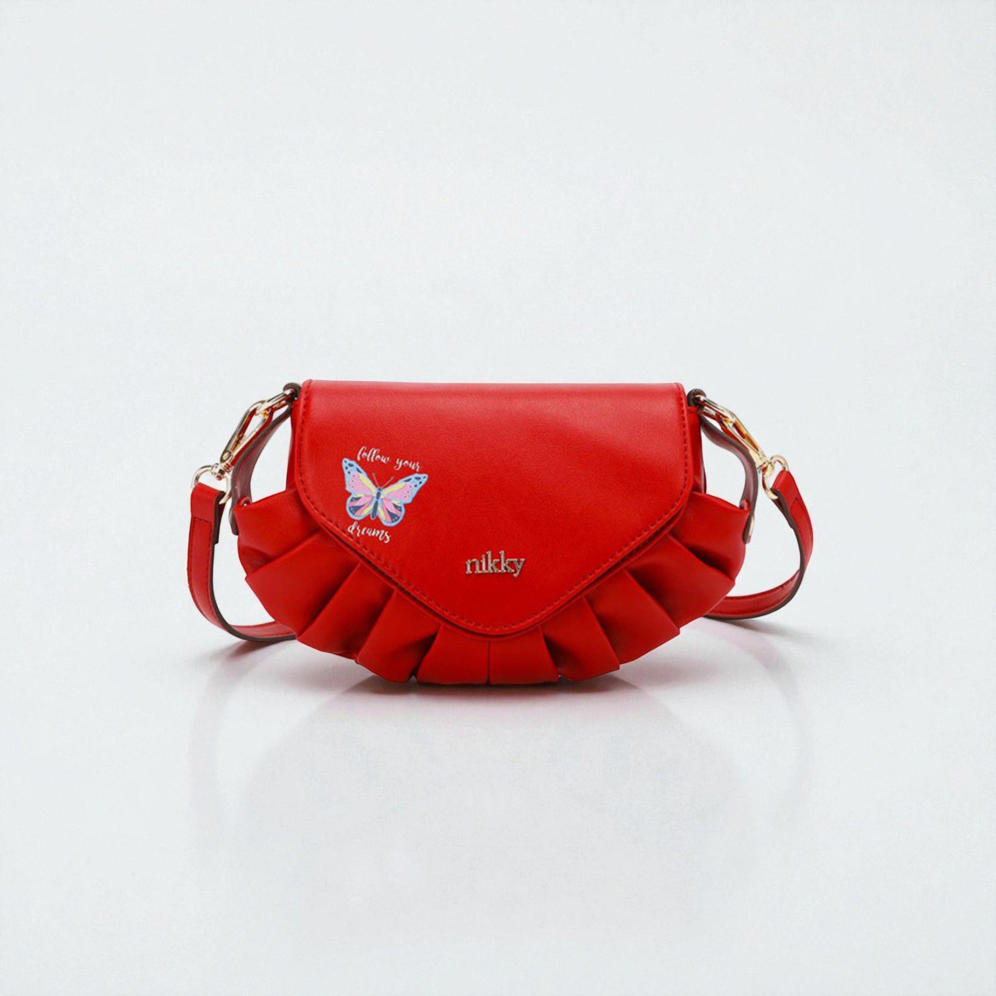 Red handbag with butterfly design and 'nikky' branding on a white background