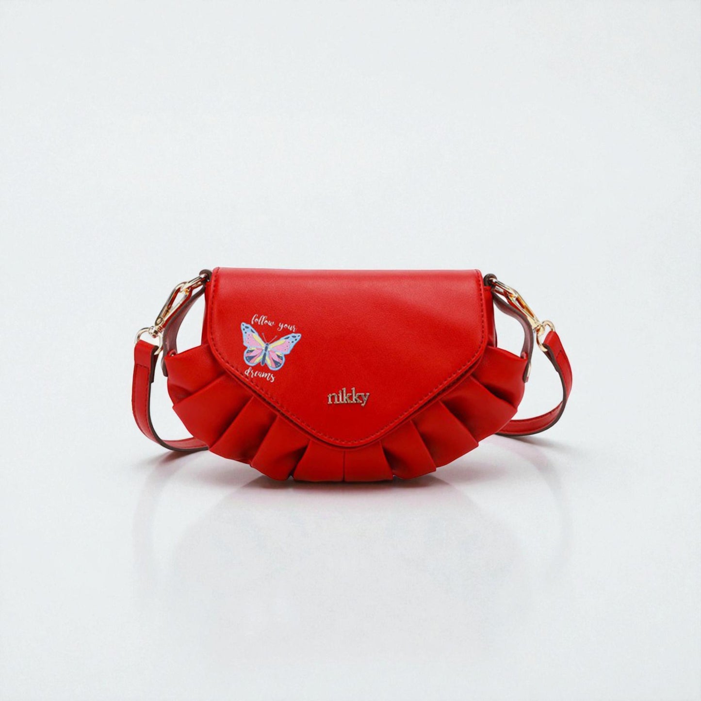 Red handbag with butterfly design and 'nikky' branding on a white background
