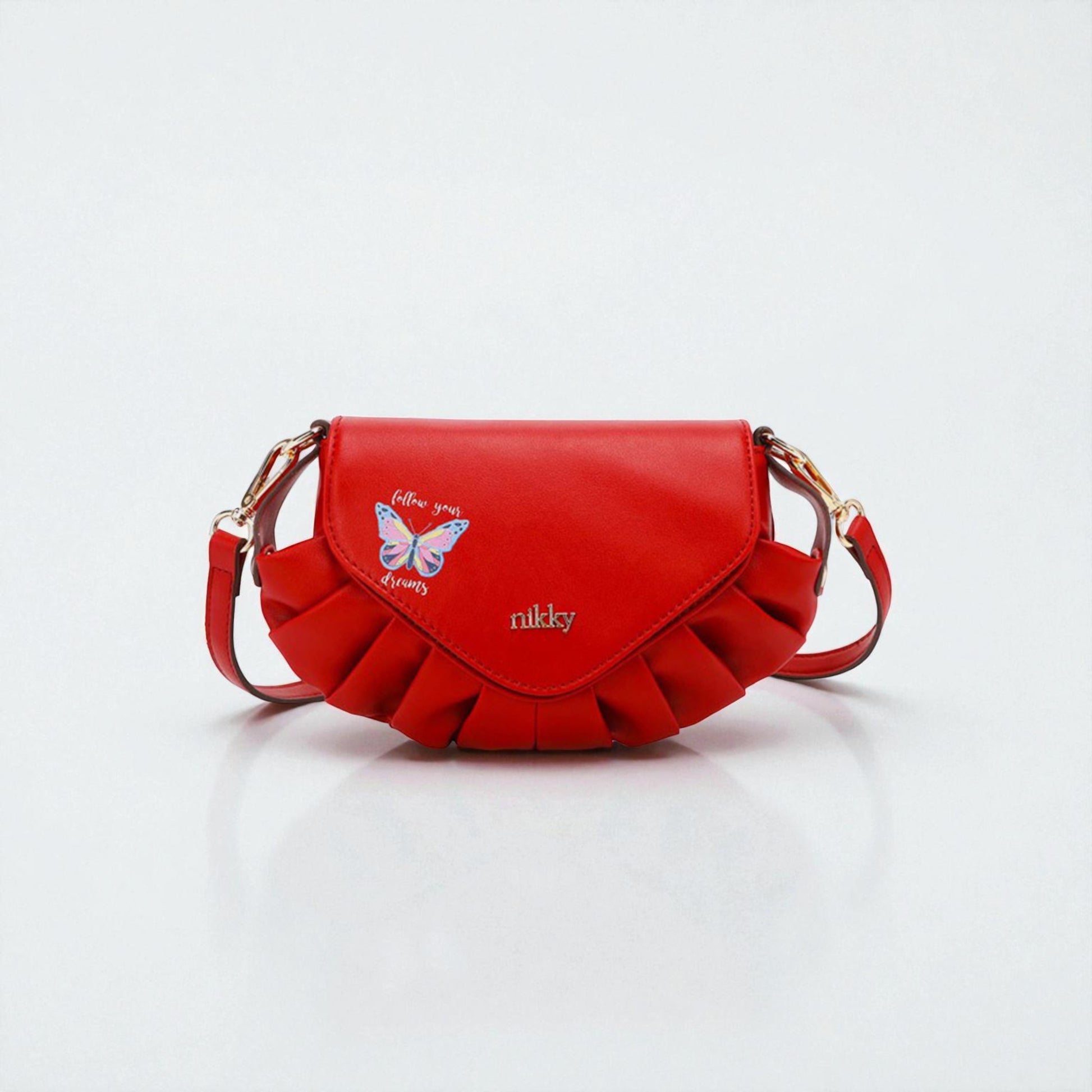 Red handbag with butterfly design and 'nikky' branding on a white background