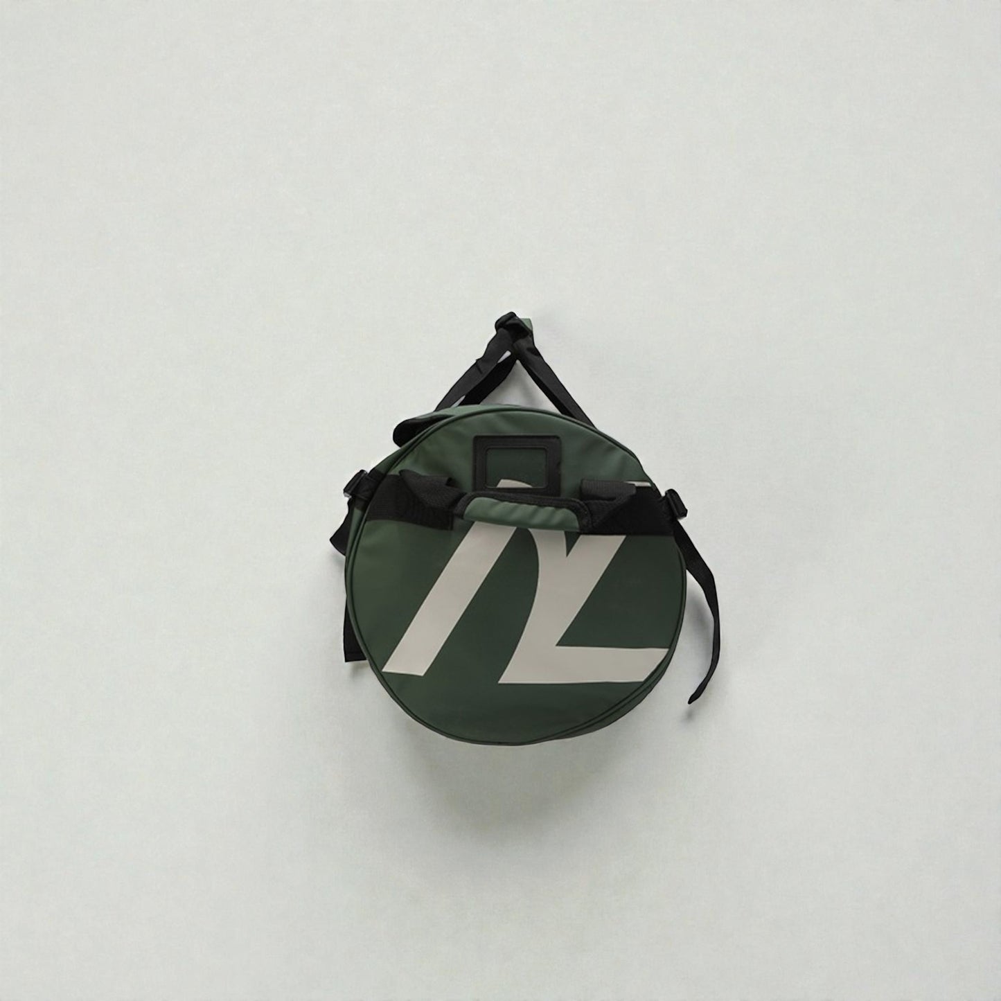 Green round bag with a logo on a white background