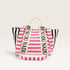 Striped bag with 'BY NODU NADU' branding on a light gray background