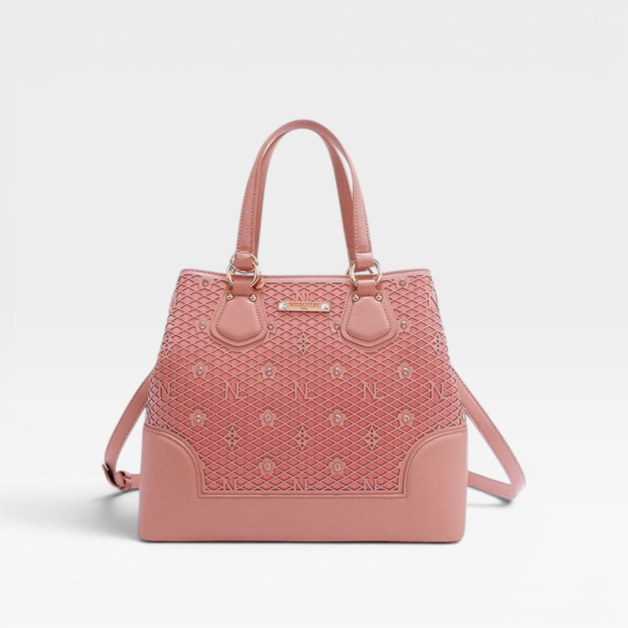 Pink handbag with decorative pattern on a light gray background