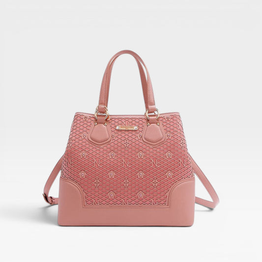 Pink handbag with decorative pattern on a light gray background