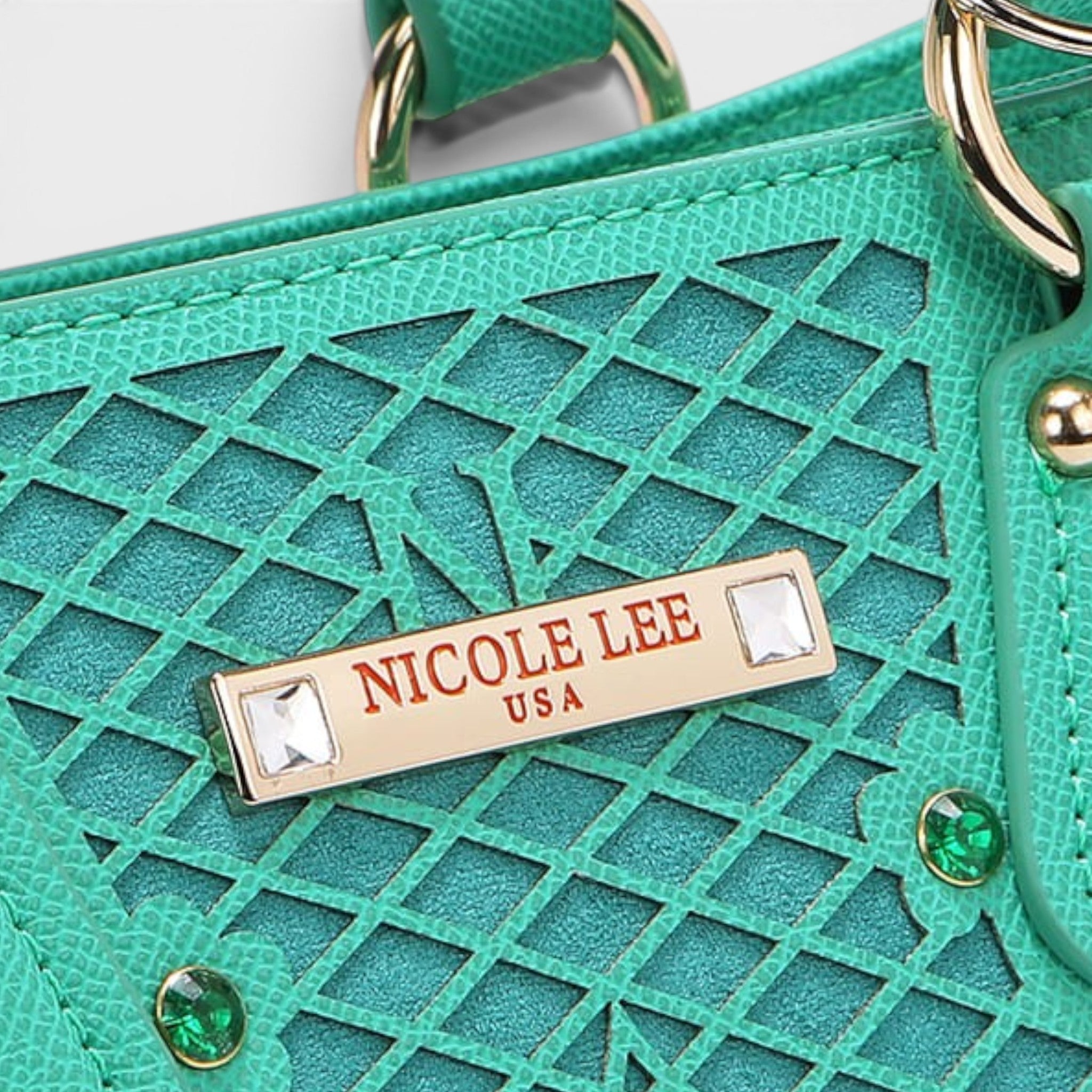 Green handbag with 'Nicole Lee USA' label on a white background