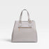 Silver handbag on a light gray background