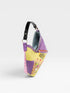 Colorful handbag with a purple handle on a white background