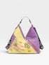Purple handbag with a colorful design on a light gray background