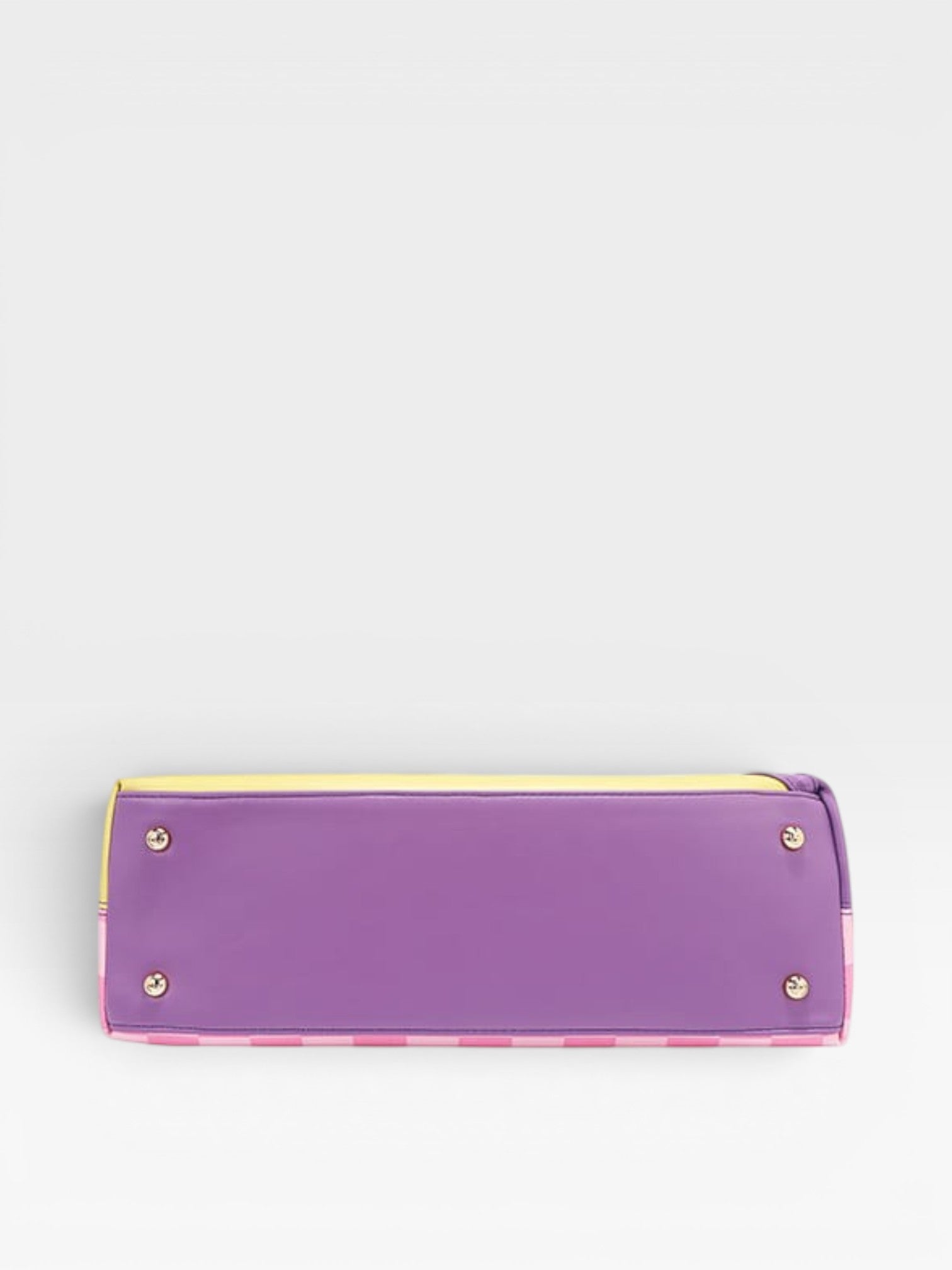 Purple handbag with gold accents on a light gray background