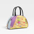 Colorful handbag with 'Nicole Lee' branding on a light gray background
