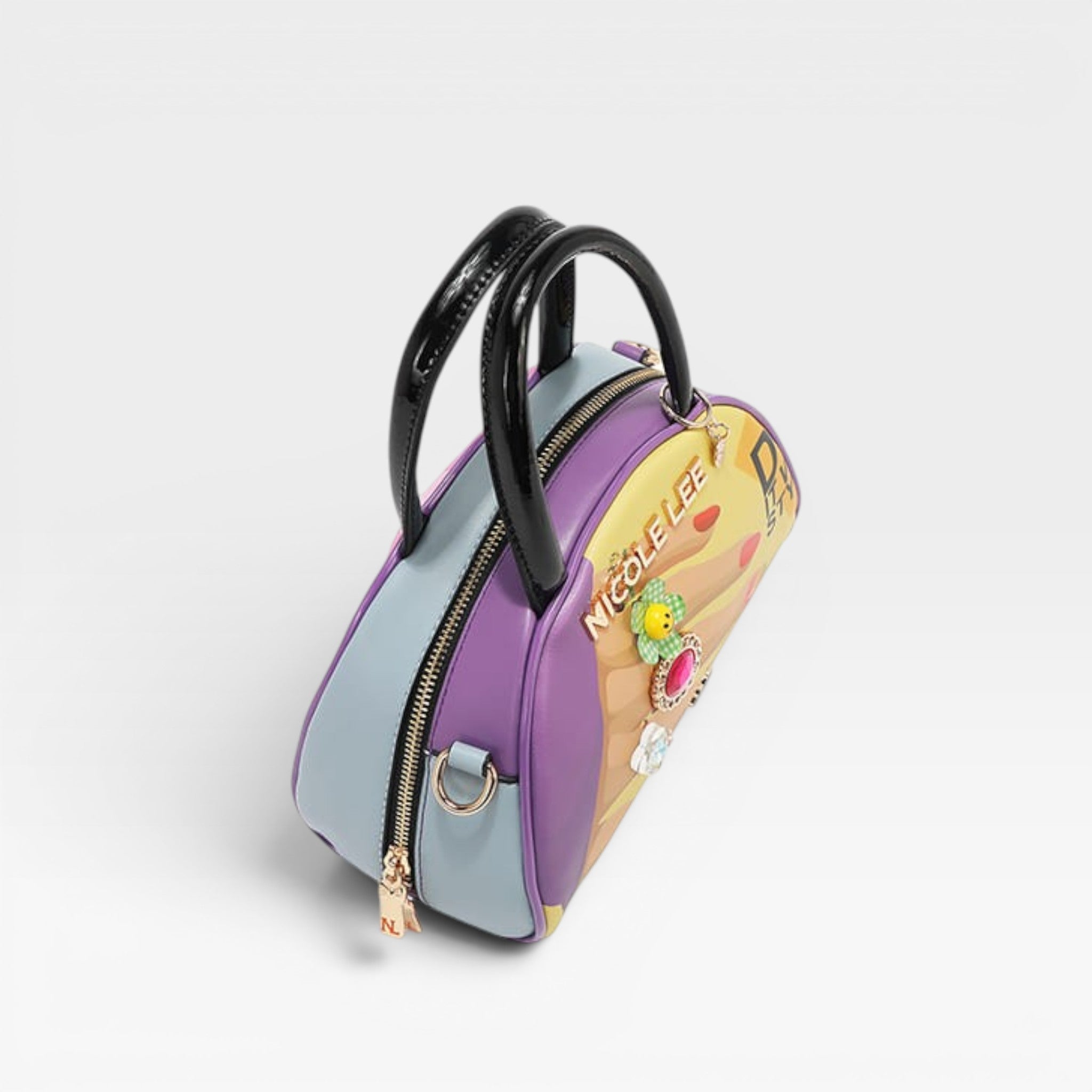 Colorful handbag with a black handle on a light gray background