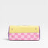 Checkered wallet with pink and yellow design on a light gray background