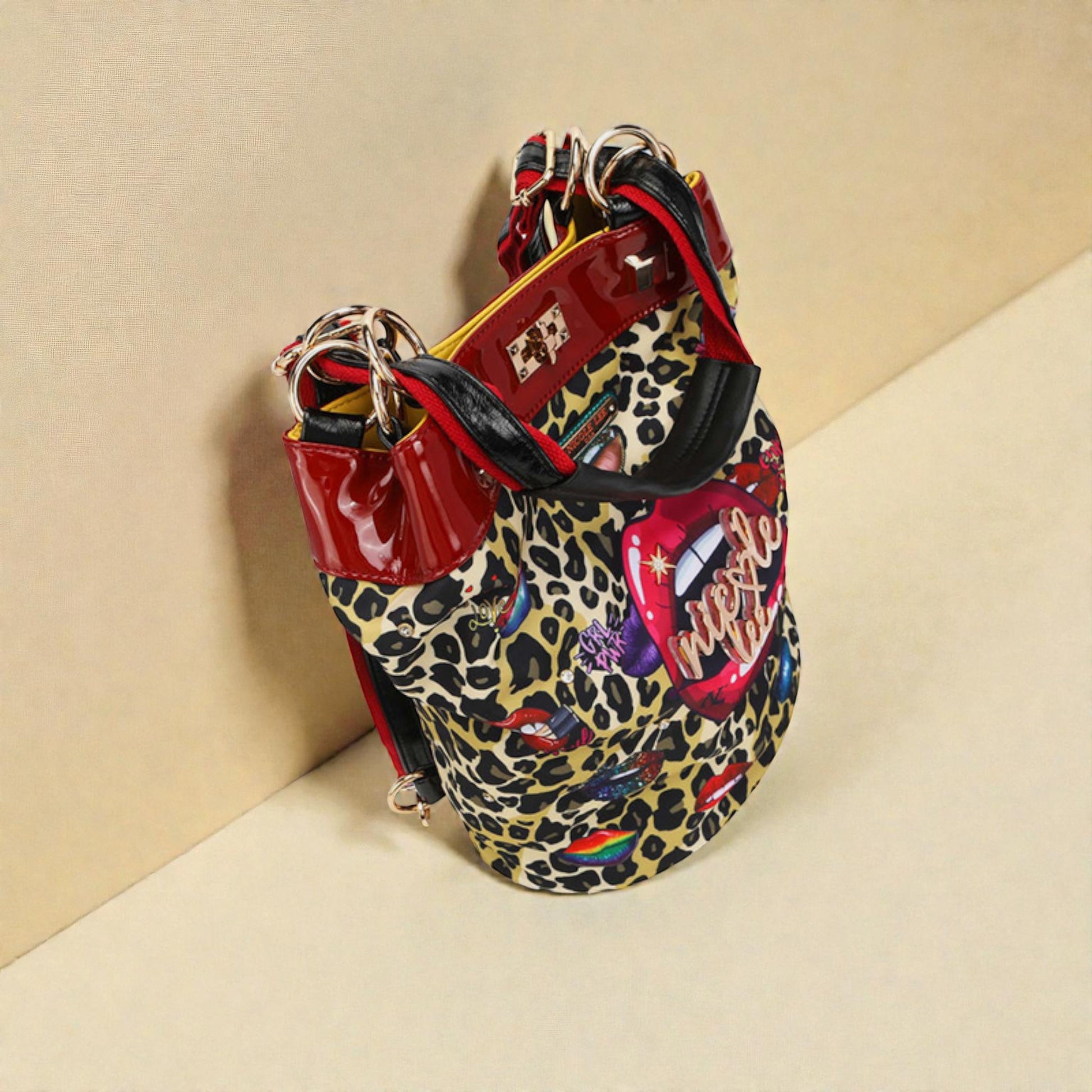 Leopard print handbag with red accents on a beige background