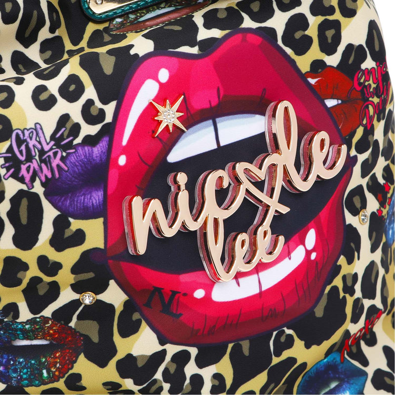 Leopard print surface with a large red lip graphic and 'nicole lee' text.