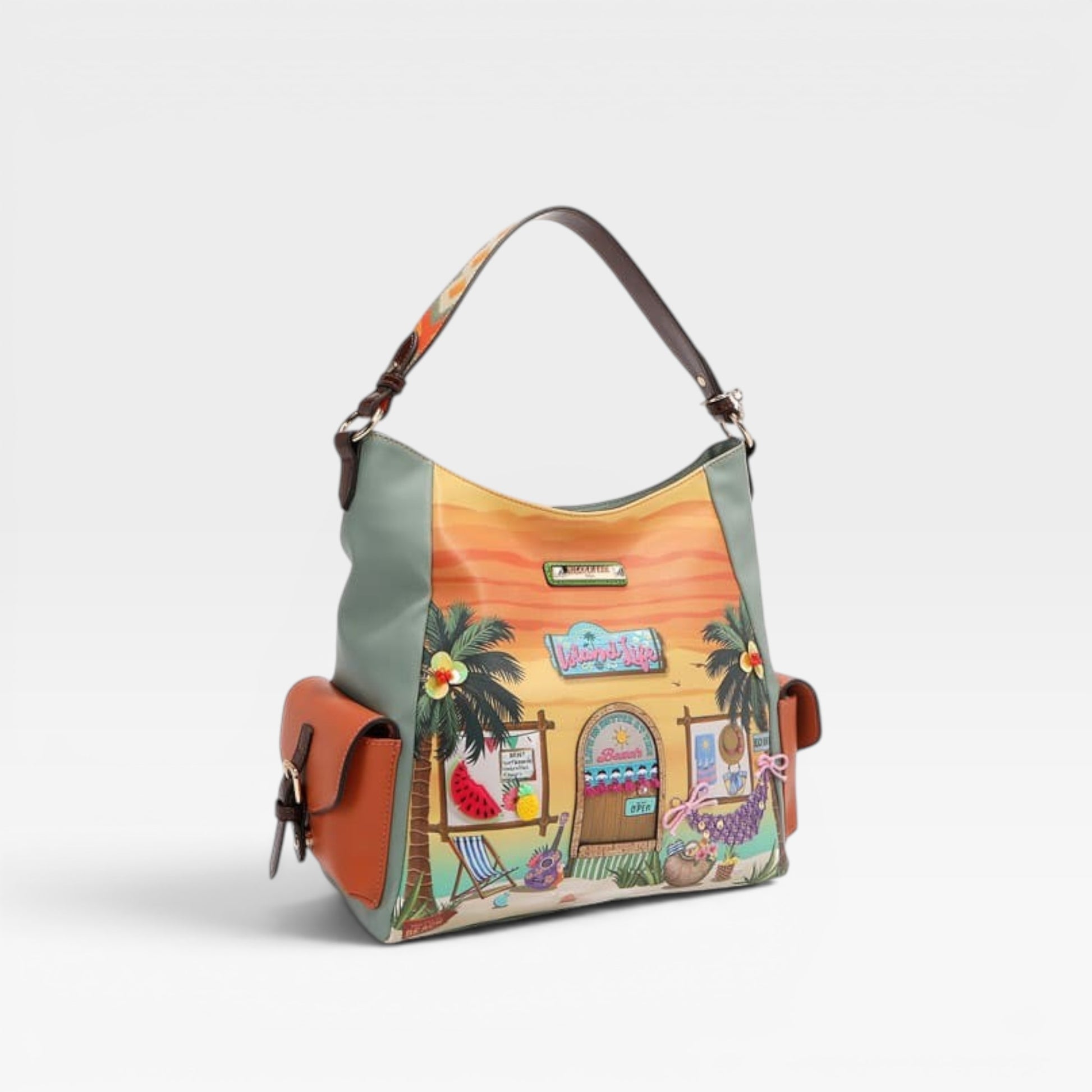 Colorful handbag with a tropical design on a white background