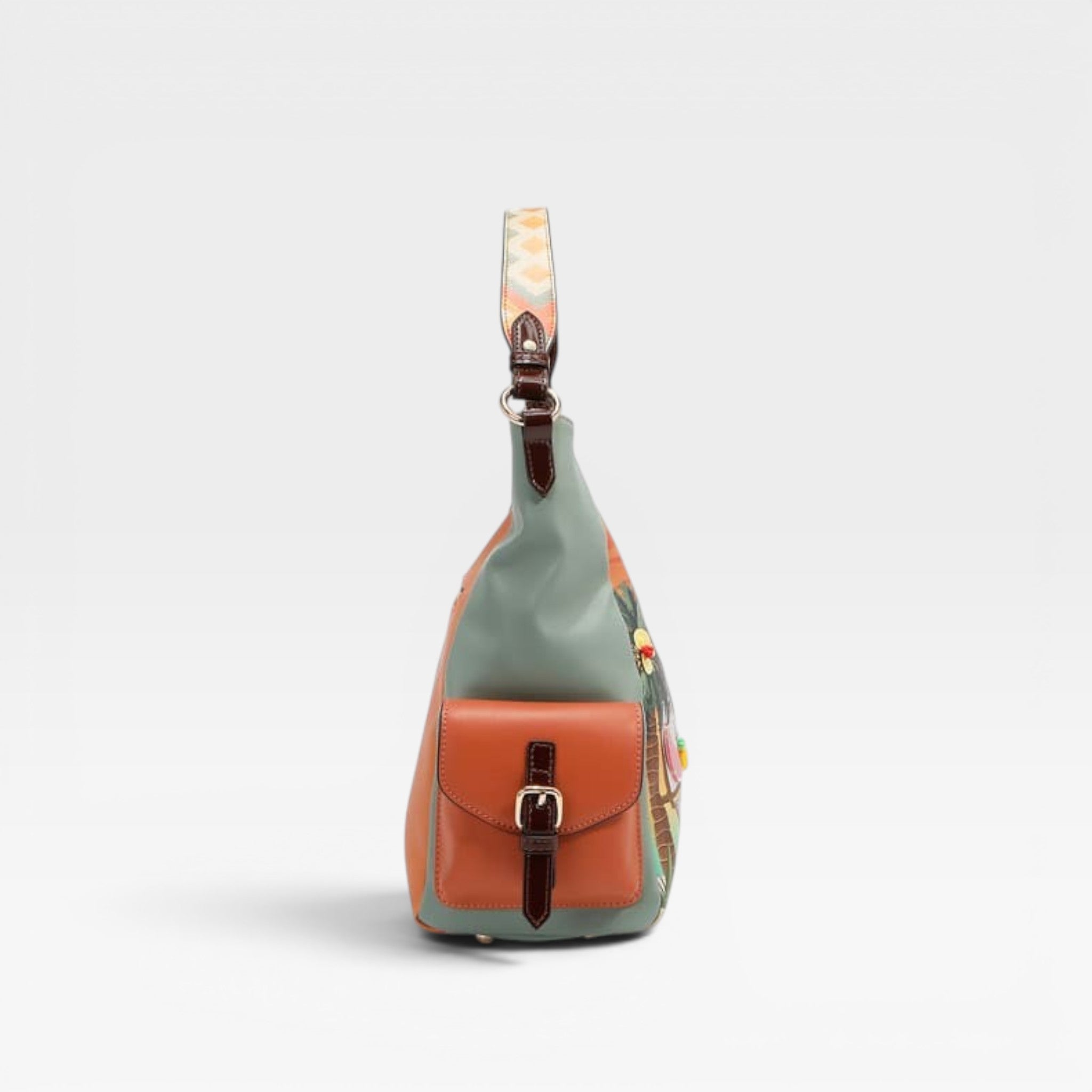 Multicolored sling bag with floral pattern on a light gray background