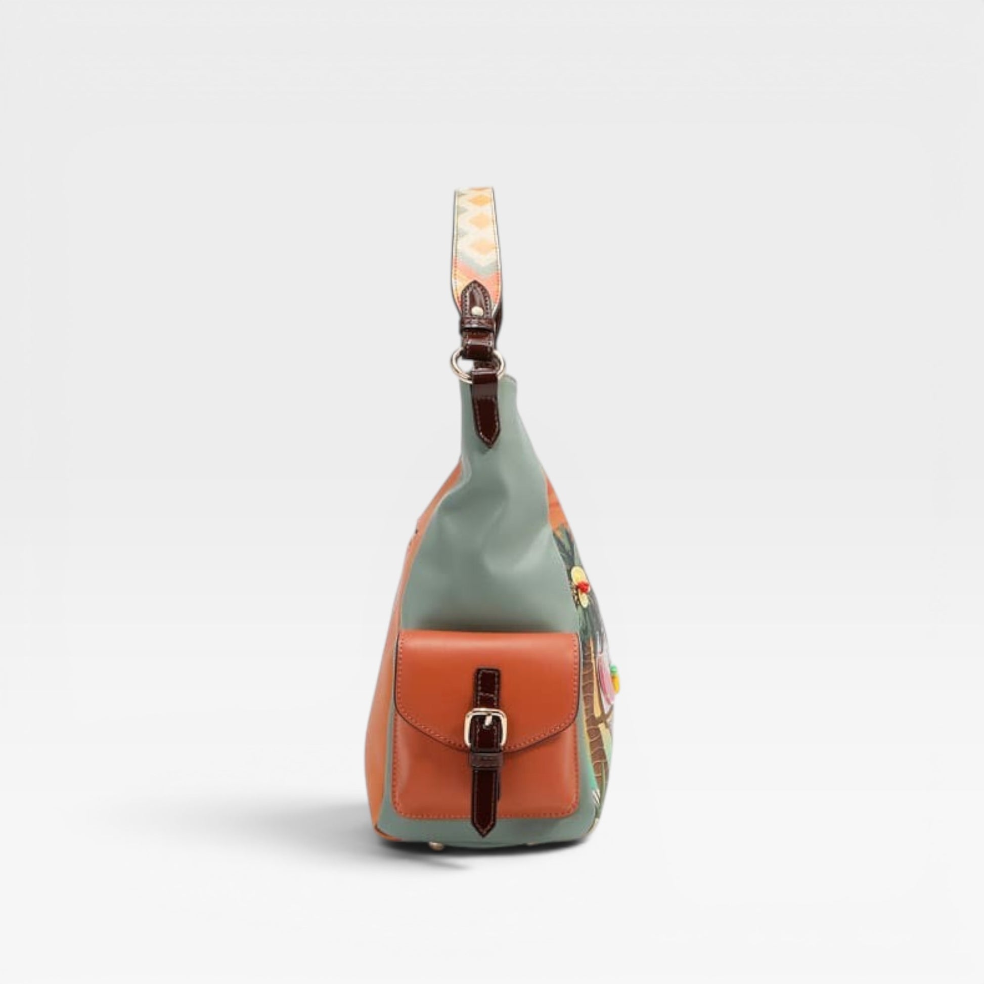 Multicolored sling bag with floral pattern on a light gray background