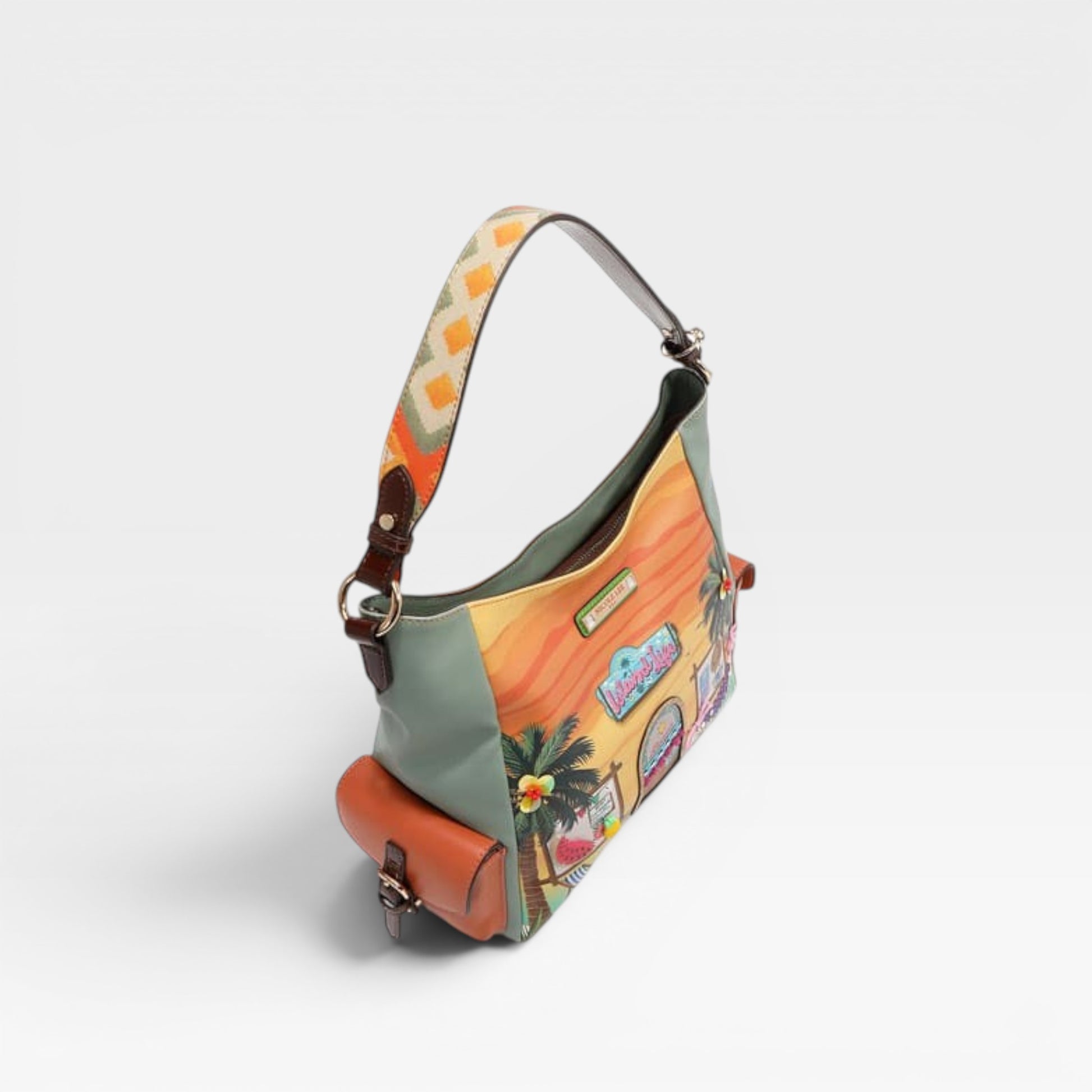Colorful handbag with a tropical design on a light gray background