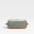 Multicolored handbag with a floral pattern on a light gray background