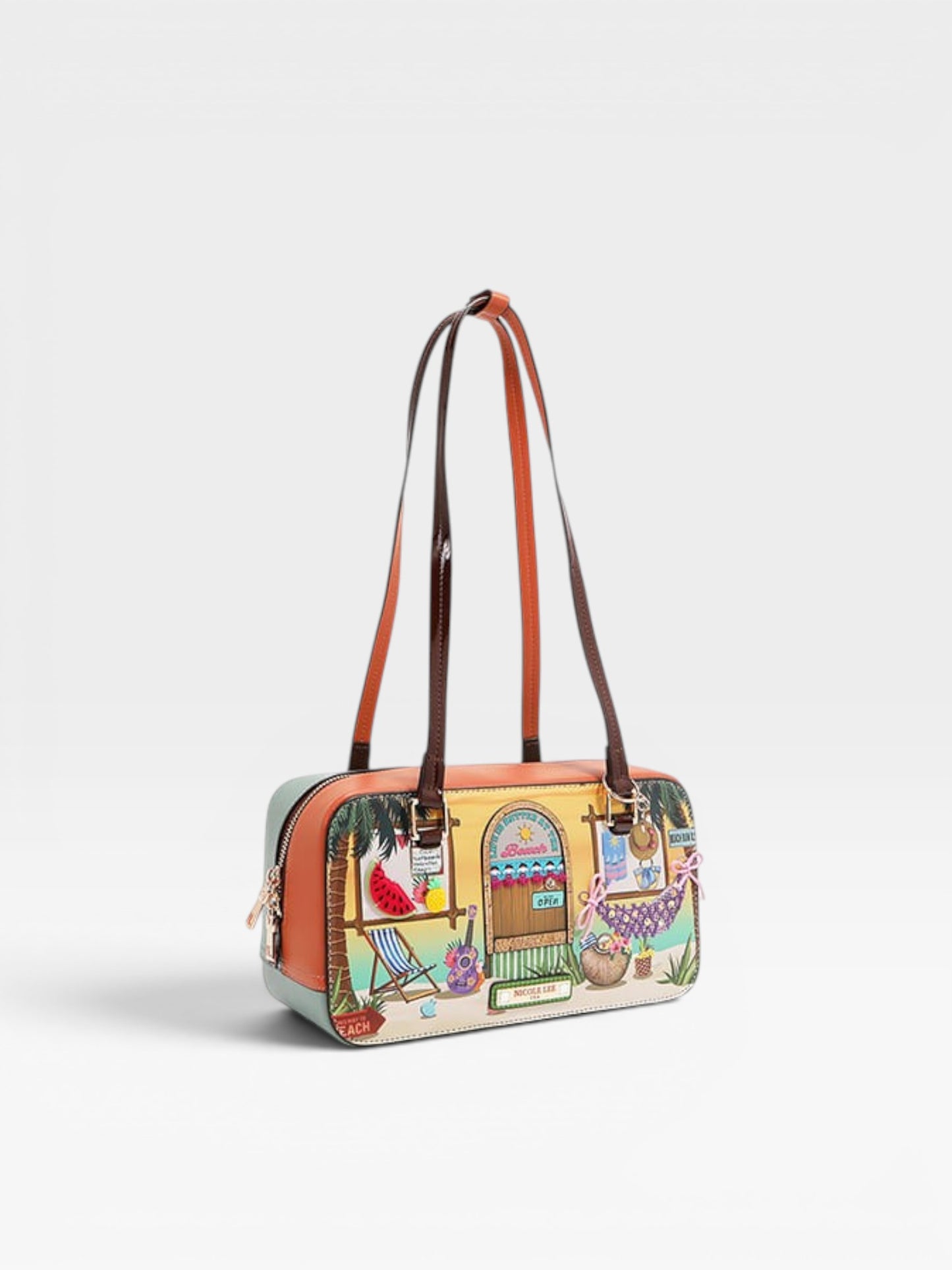 Colorful handbag with a design of a beach scene on a white background