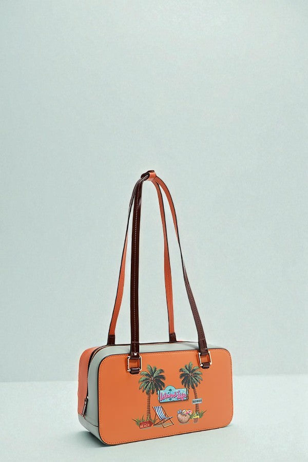 Orange handbag with palm tree and beach chair design on a light gray background