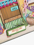 Colorful card with a wooden door, 'Open' sign, and 'Nicole Lee USA' label.