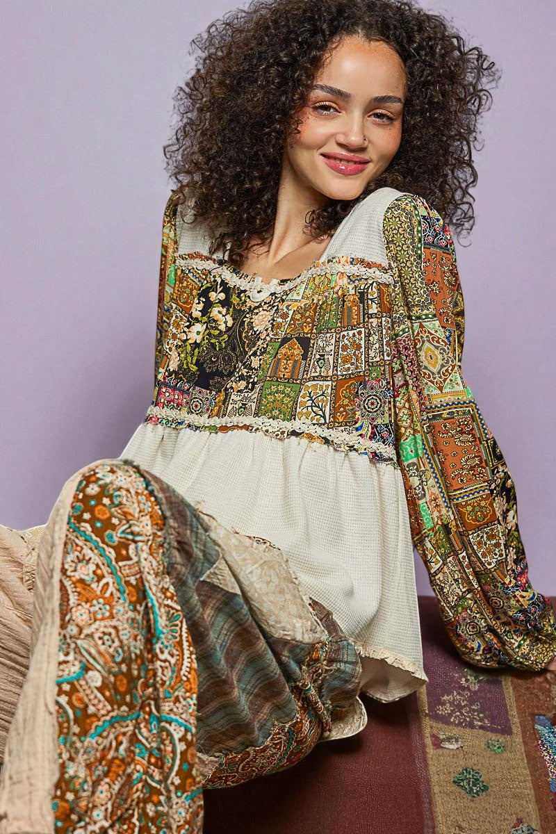 Woman wearing a colorful patterned top and skirt against a purple background