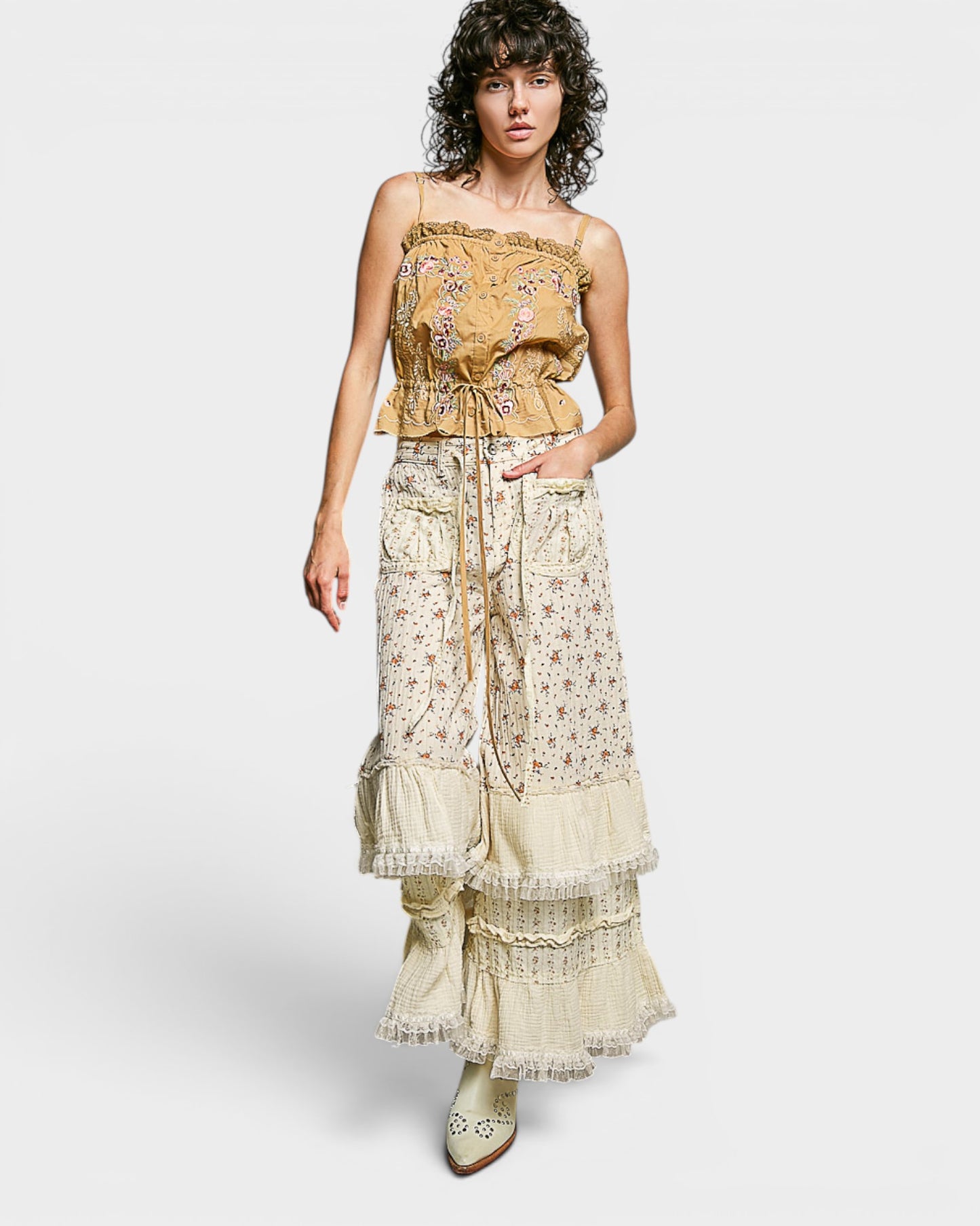 Woman wearing a floral dress with a white background