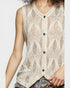 Beige knitted vest worn by a person on a plain background
