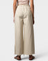 Beige wide-leg pants worn by a person on a white background