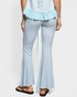Light blue striped pants worn by a person on a white background
