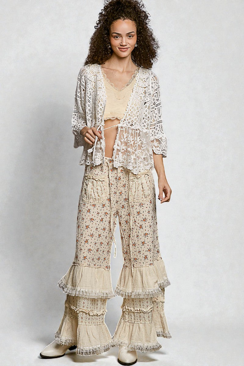 Woman wearing a floral outfit with a white background