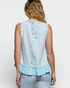 Light blue sleeveless top with floral embroidery on a white background