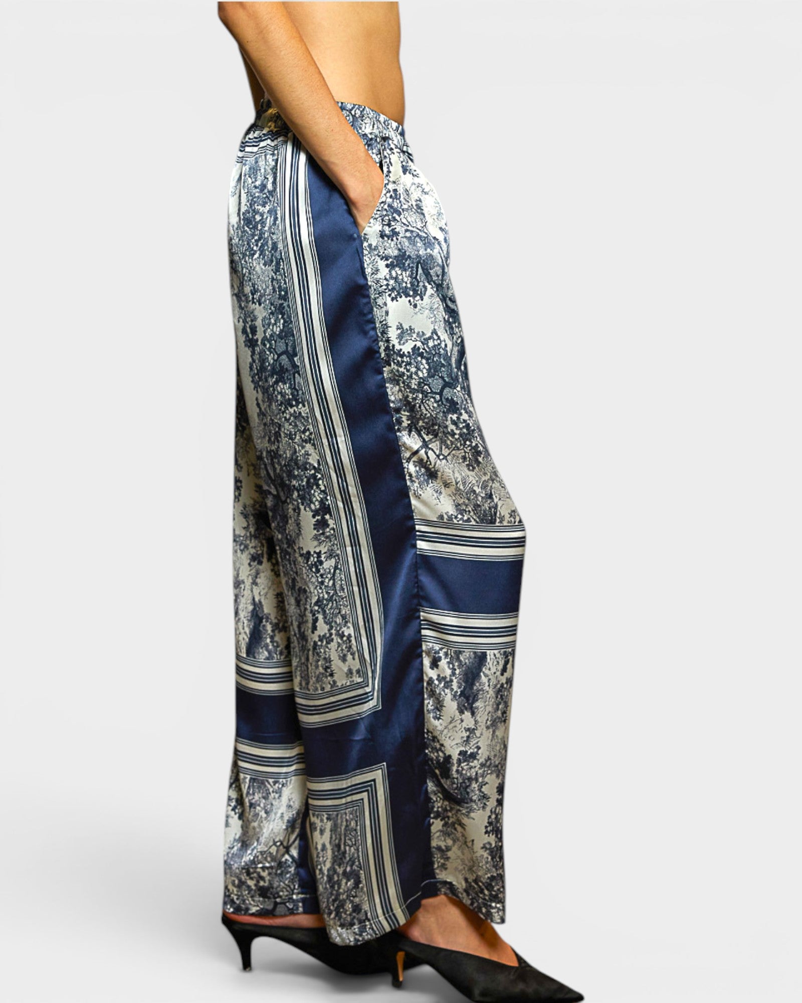 Floral and striped wide-leg pants on a white background