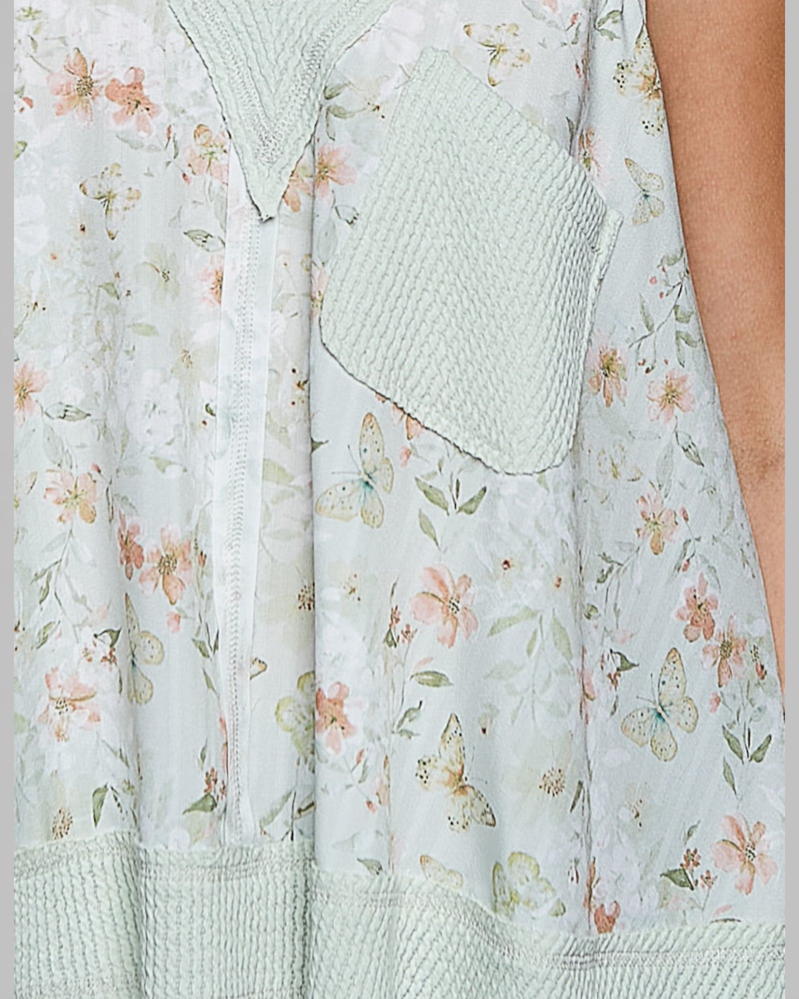 Light blue floral dress with a textured fabric pattern