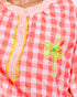 Pink and white checkered shirt with embroidered palm tree design