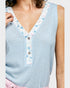 Light blue sleeveless top with floral trim on a plain background
