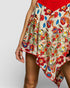 Colorful floral skirt with a plain background