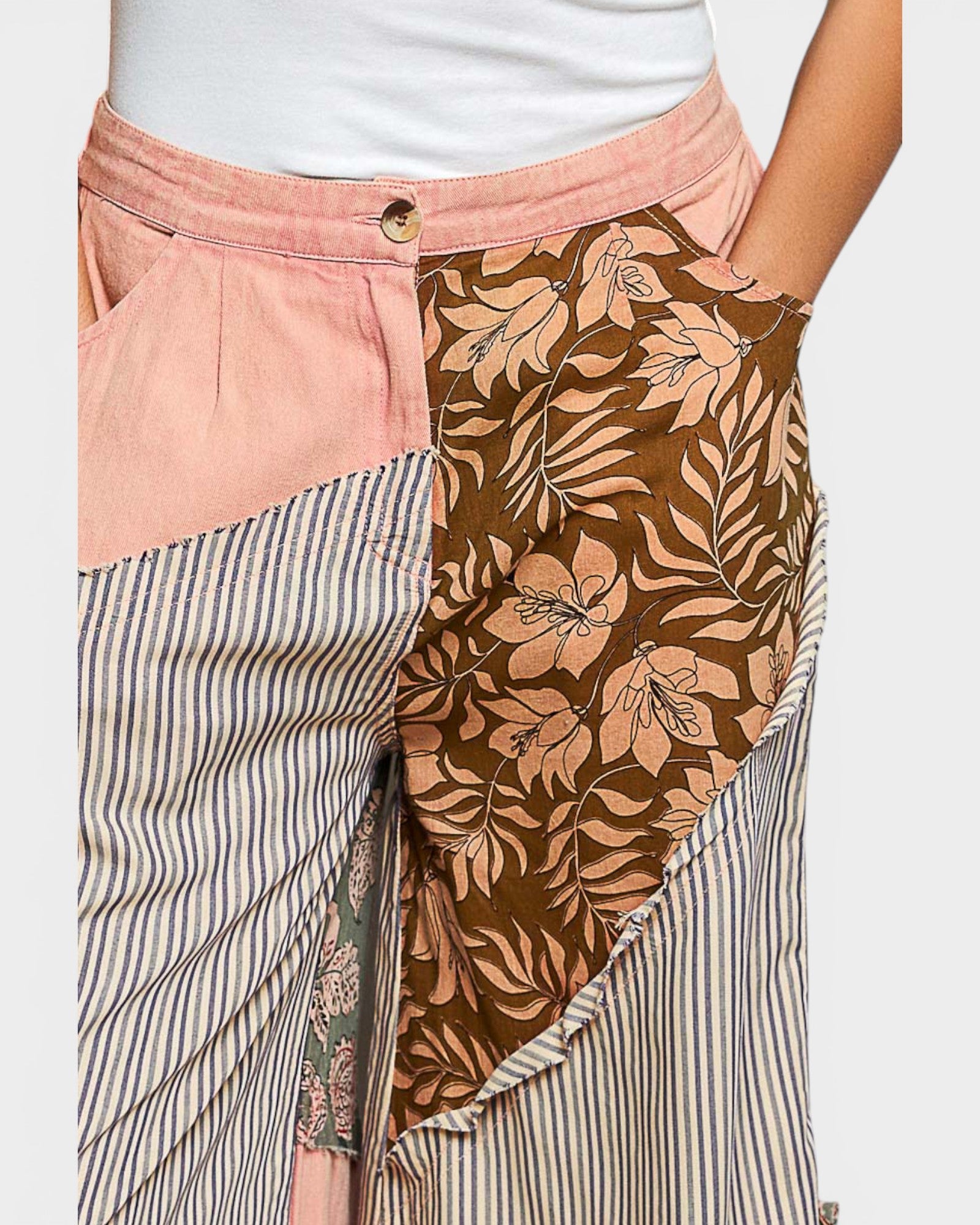 Skirt with floral and striped patterns on a plain background