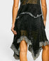 Black lace dress with silver trim on a white background