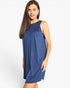 A woman modeling a sleeveless, knee-length blue dress with a gathered, pleated bodice against a plain light gray studio background.