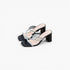 A pair of women's black mule sandals with square toes, featuring criss-crossing straps embellished with silver rhinestones and a chunky black block heel, shown on a light gray background.