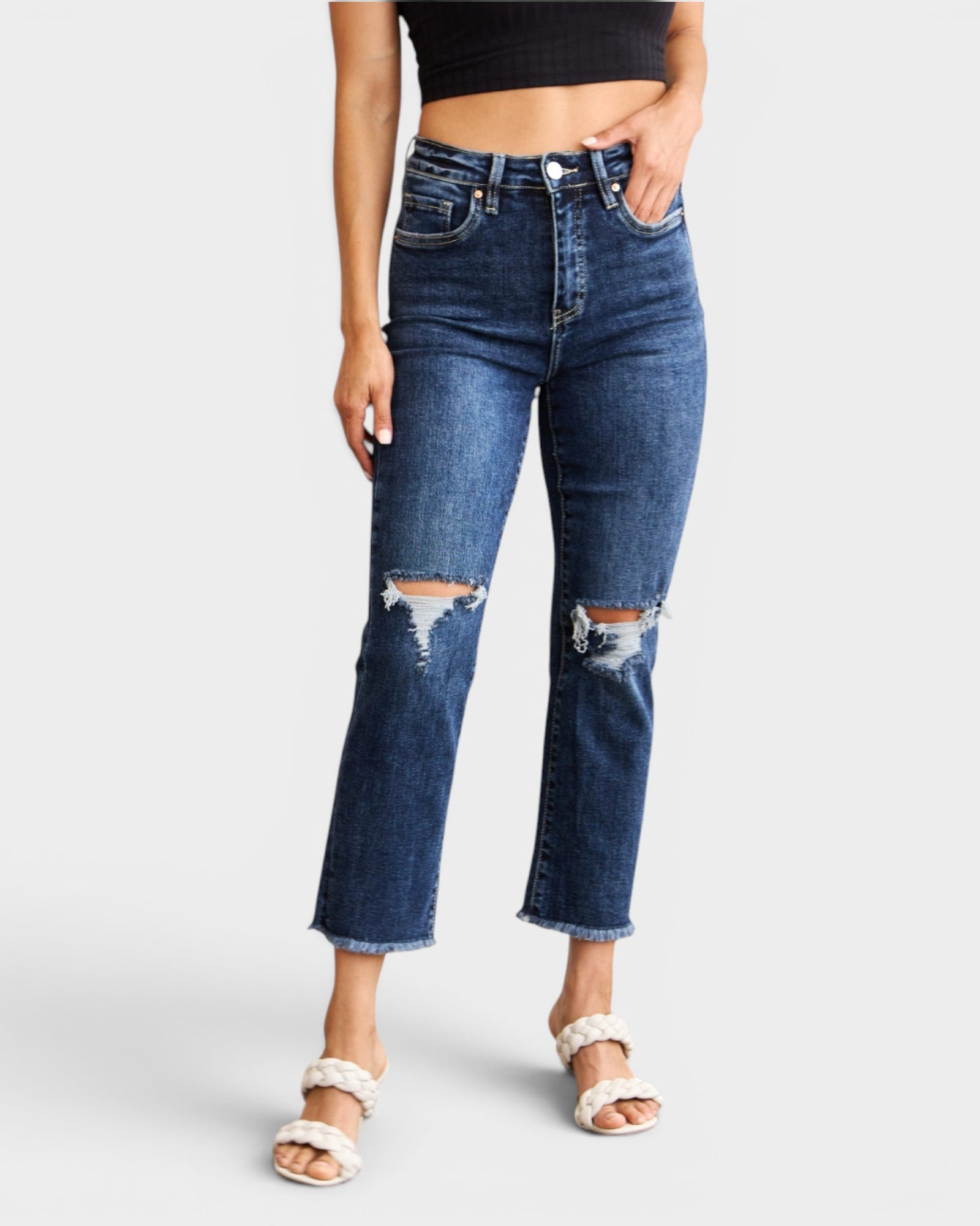 Jean taille haute délavé foncé avec ourlet brut et effet gainant