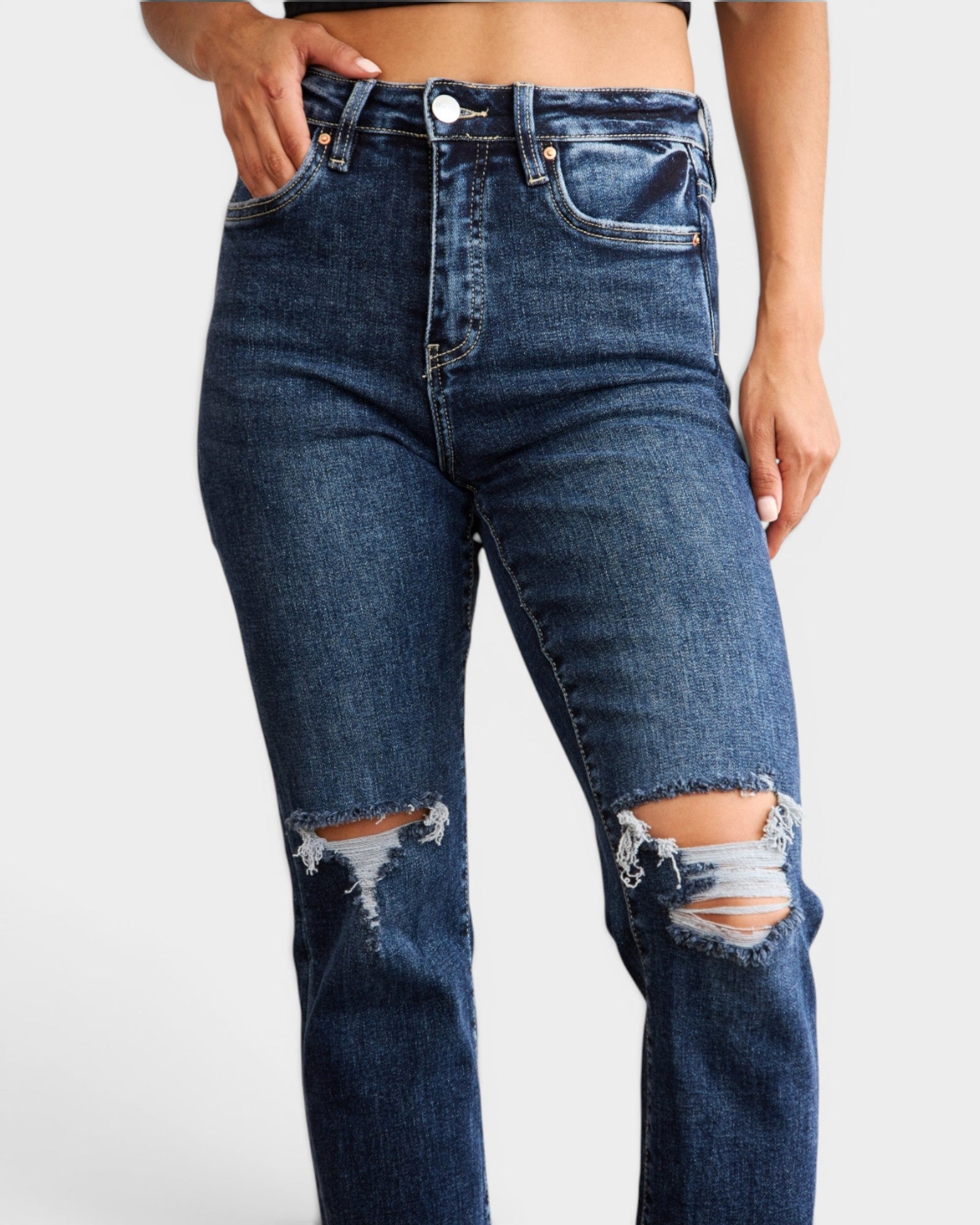 Jean taille haute délavé foncé avec ourlet brut et effet gainant