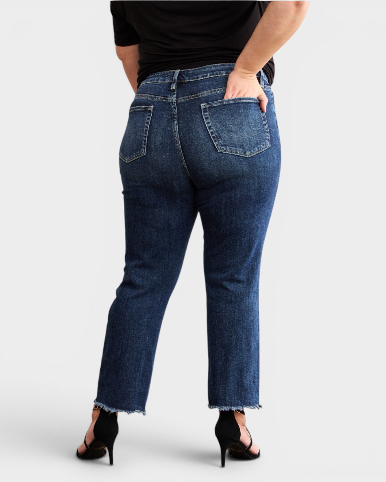 Jean taille haute délavé foncé avec ourlet brut et effet gainant