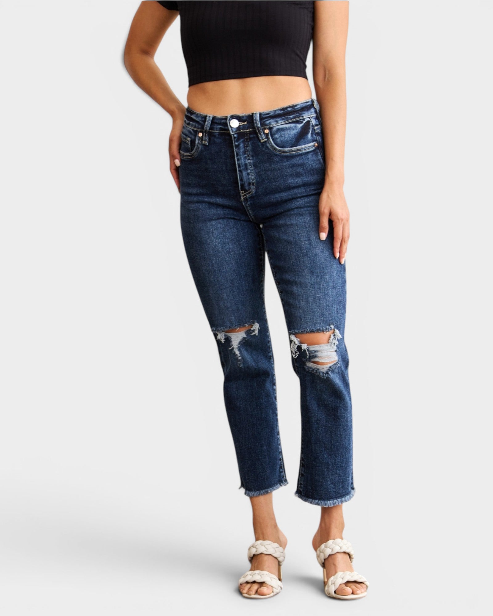 Jean taille haute délavé foncé avec ourlet brut et effet gainant